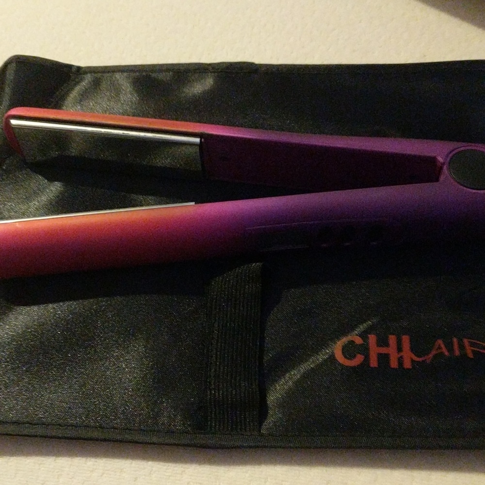Used Chi straigthening iron and heat pad